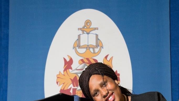 Paraplegic man graduates with master’s degree thanks to his wife’s support