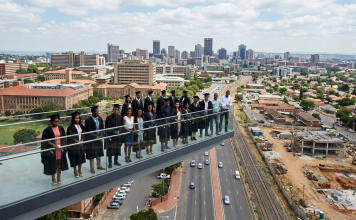 The Architecture of Aspiration: Scaling the Student City to combat the Graduation Cliff